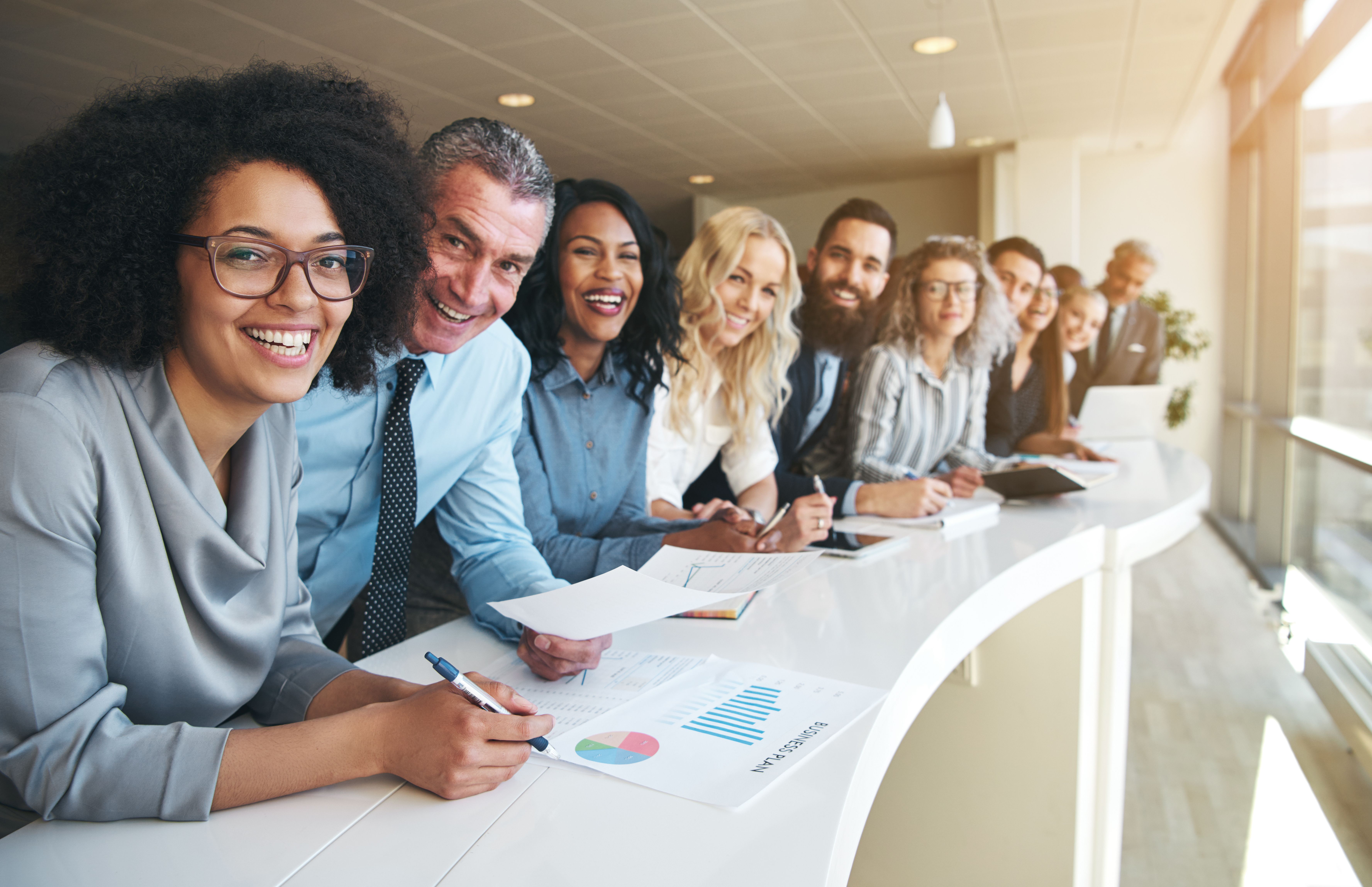 Employees smiling together