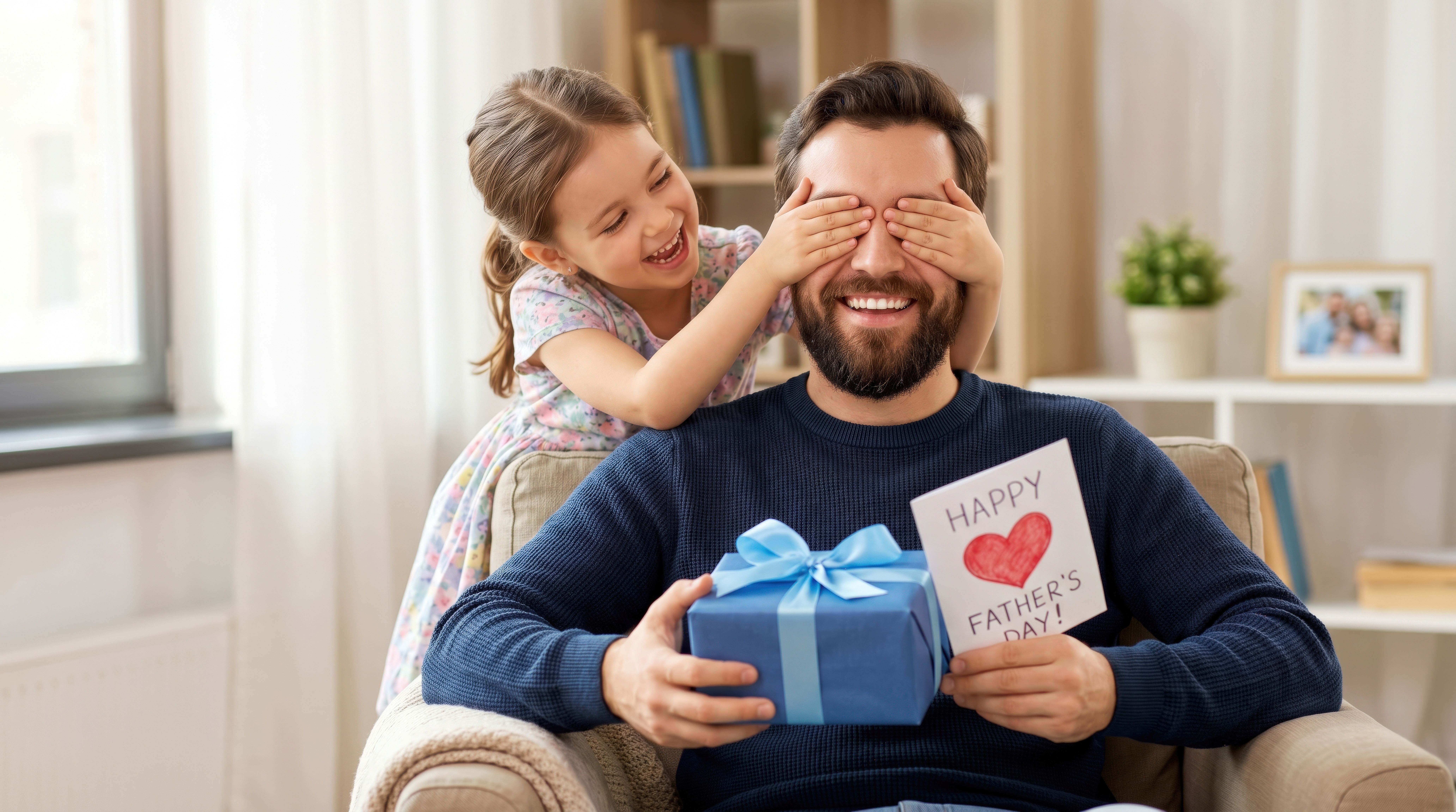 Father getting a gift from his daughter