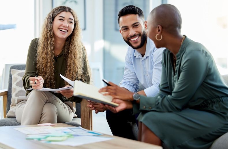 Employees engaged in a happy conversation